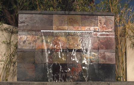 outdoor concrete waterfall on patio