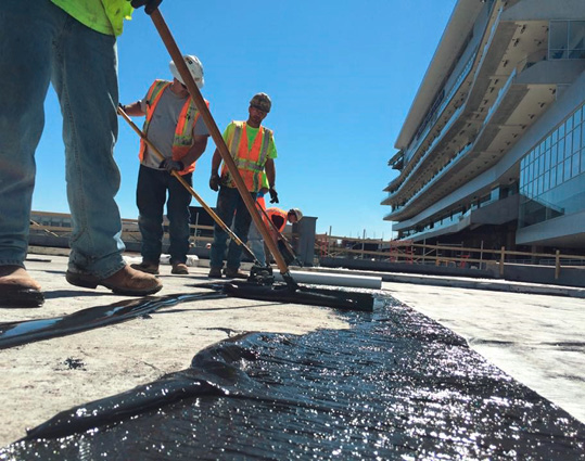 cold applied waterproofing material and reinforcing fabric