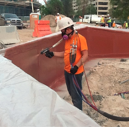 waterFX worker applying the VersaFlex polyurea