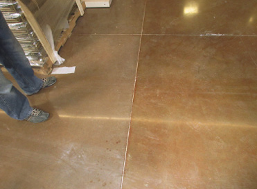 Discoloration between two different parts of the same floor.