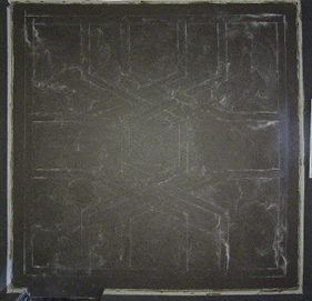 light colored chalk design on concrete 
