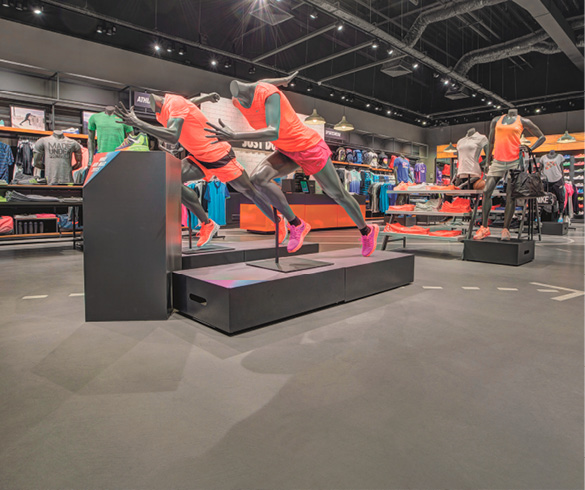 Sports apparel store in Italy uses polished concrete floors to enhance its products.