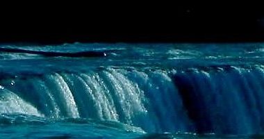 Water flowing over cliff