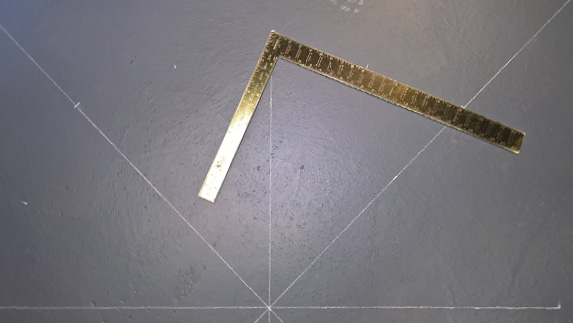 Now do the same thing to half of the medallion. You will find center four times between the current lines using your 2-foot dashes and the end of your 4-foot lines