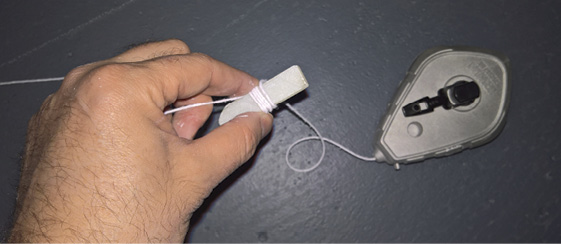 How to use a chalk line to draw a circle on a floor.