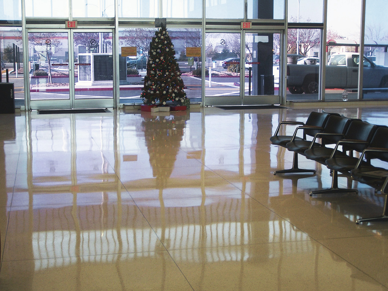 Making the switch to polished floors has paid off for Stockton Metropolitan Airport in California. Seen here is the lobby after it was polished. The photo on the next page is what it looked like before.