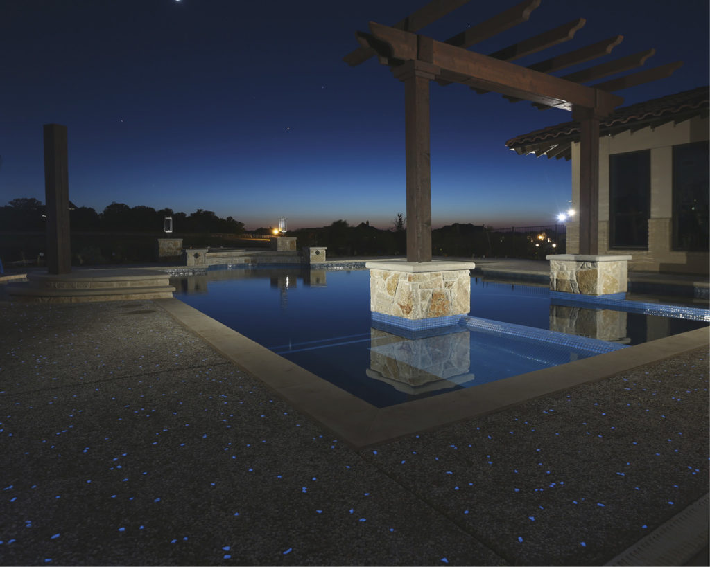 Exposed aggregate of the pool deck has also included glow in the dark stones.