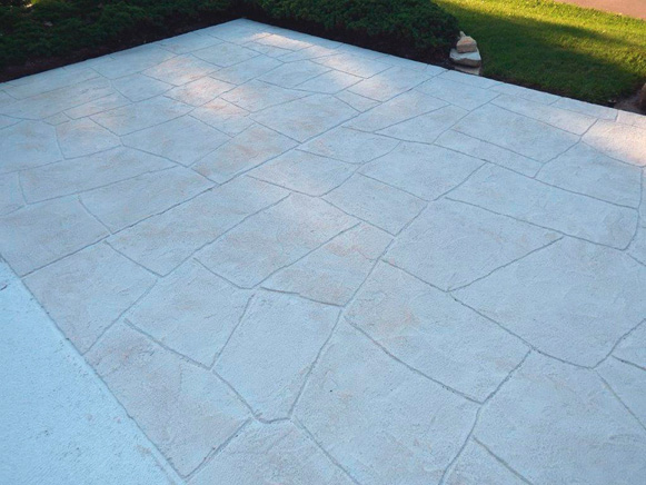 This is what a limestone overlay looks like after its carved but before its colored and grouted.
