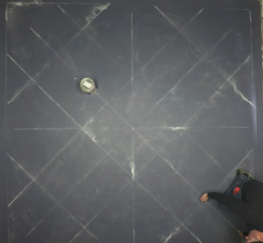 Then I created my Cartesian coordinates by chalking a big X through my design. You can use the diagonal intersections to help chalk those lines.