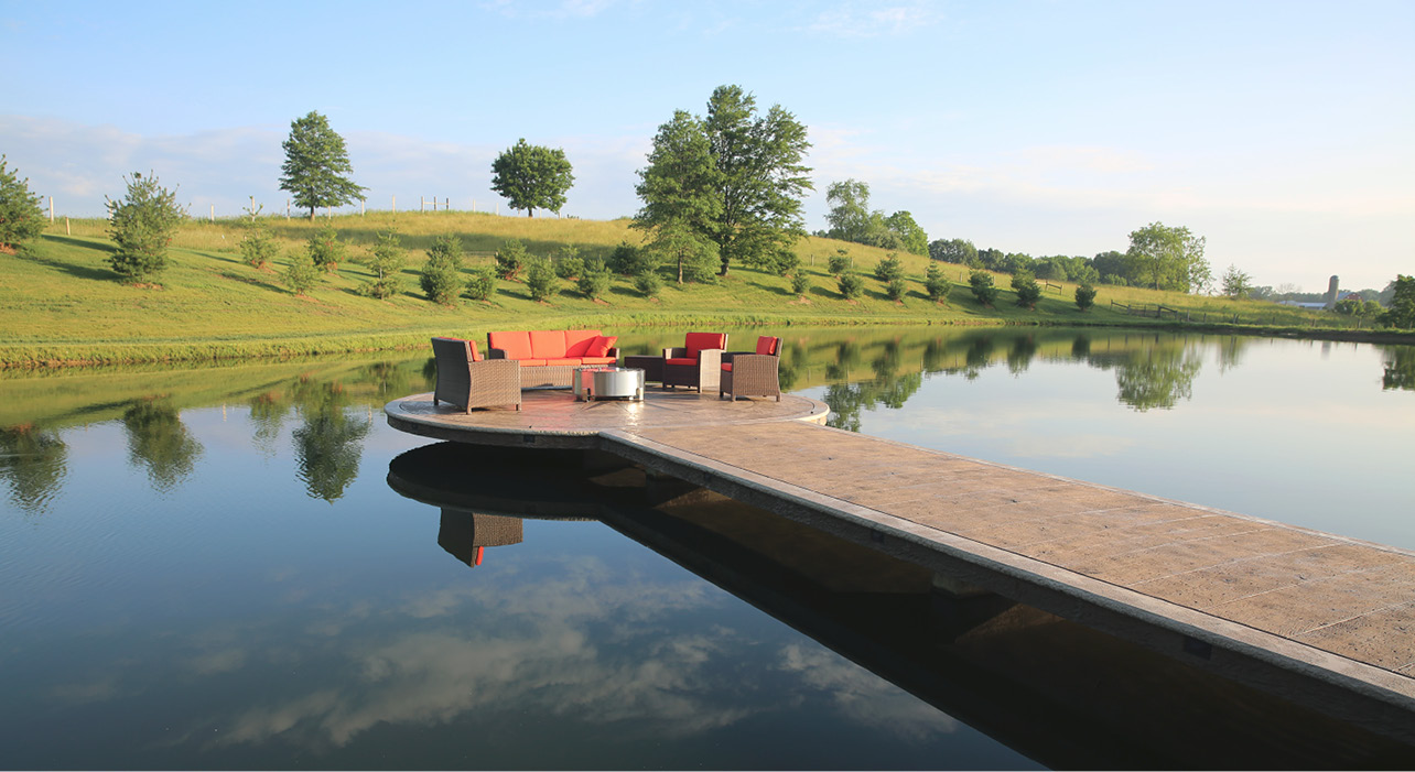 The pier and dock, which sit about a foot above the surface of a 2-acre pond in Keims backyard, was fashioned with Proline form liners, stamps and texture mats and built with an array of products largely from Deco-Crete Supply.