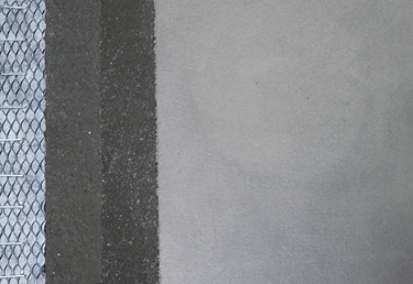 This sample shows a plywood substrate transformed to a concrete surface with Westcoats ALX Interior system.