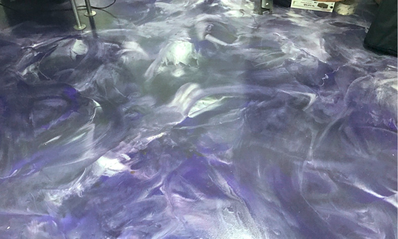 This office in Fullerton, California, features Excalibur 321-100 with a matte finish. Despite having a texture grit for nonslip, the surface still shows some nice depth.