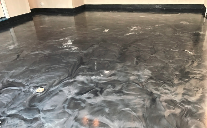 This shower room in Las Vegas featuring Excalibur 321-200, which has texture, is also nonslip but offers a more satin finish. It allows a lot of color movement, while also incorporating safety features. Photos courtesy of Excalibur Flooring & Surface Artisans