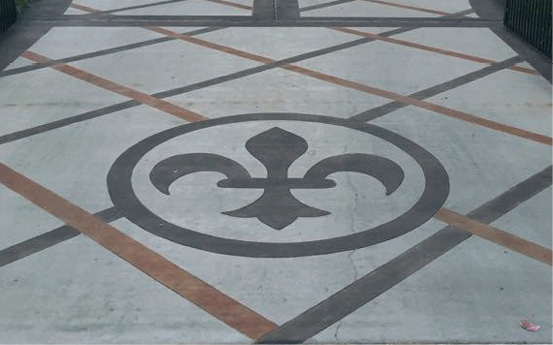 One of the jobs Lynch loves most is in his own office. He installed a Jack Daniels floor using an overlay made to look like old oak strips. He put the Jack Daniels logo in the middle of the floor, with barrel heads around it. One of his employees, Elkey Burlette, is a graphic designer who did all the stenciling.