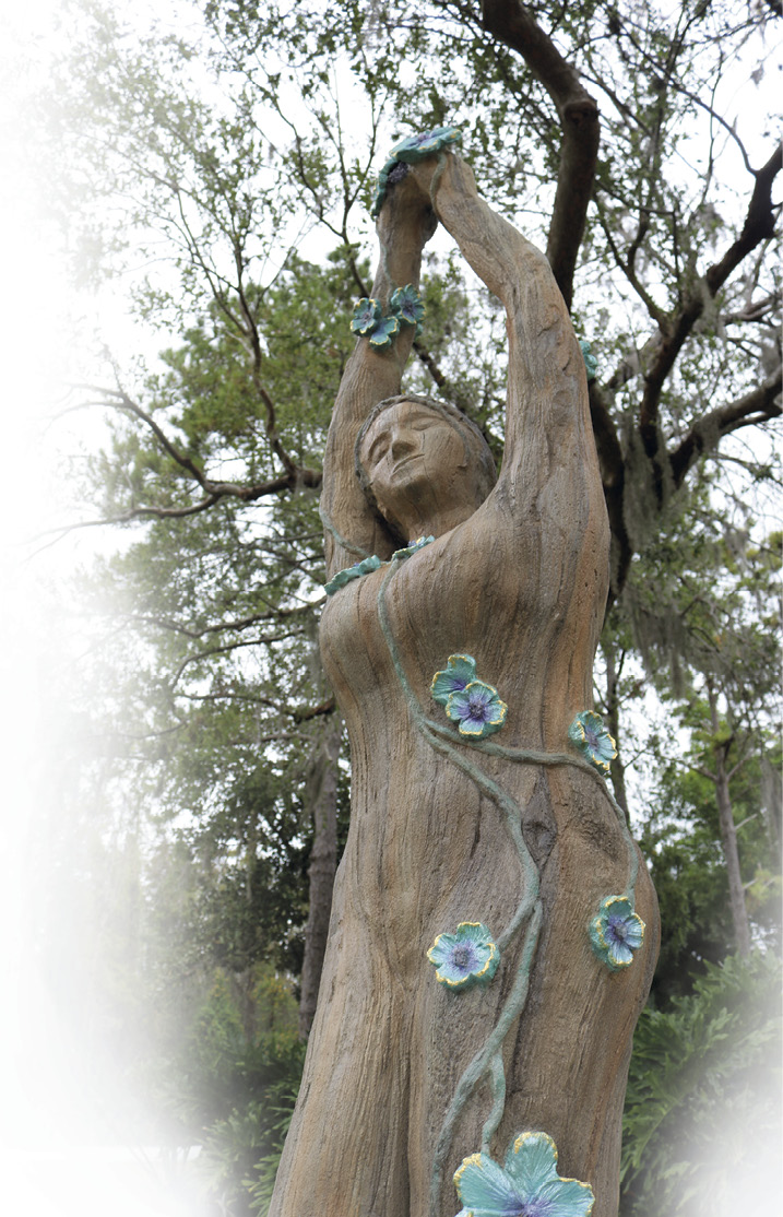 A carved concrete feminine figure designed and built during the Concrete Decor Show in Florida.