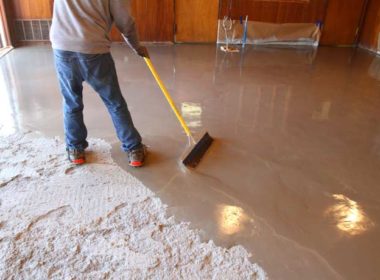 Self-Leveling Concrete Compound being spread on concrete