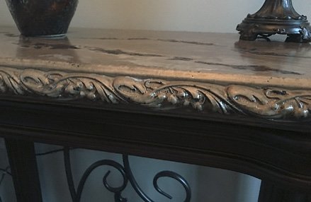 Concrete topped entry table with edging design with a form liner. Photos courtesy of Concrete In-Counters concrete countertop