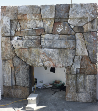 Prefabricated fireplace made of concrete by Joshua Annis at Concrete Decor's Decorative Concrete Live.