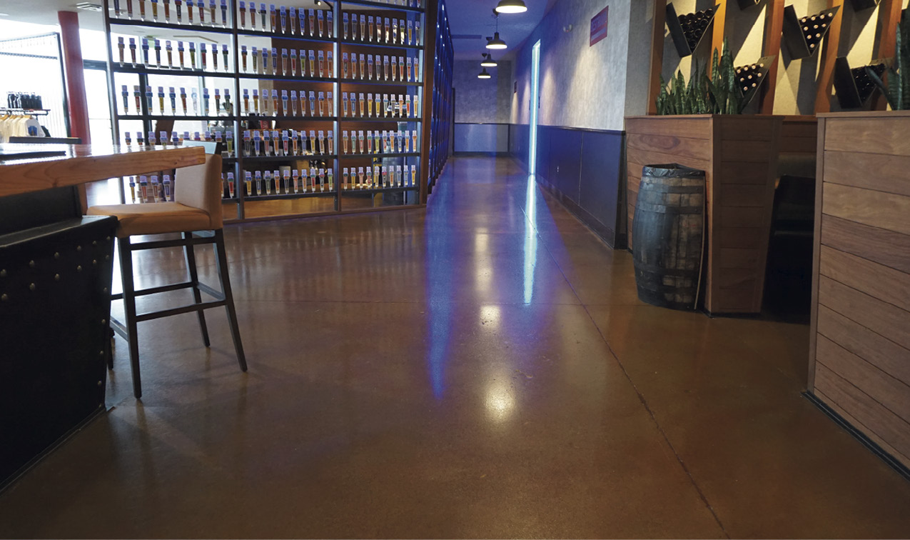 Acid or Water-based Stains is a question for the ages - this space in a restaurant shows acid staining