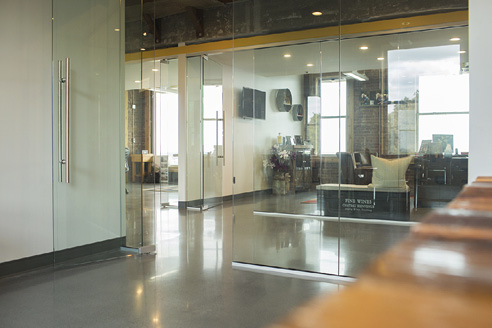 Originally a hospital, this six-story renovated office building had a floor that had been through several years of changes and was covered in cracks, voids, debris and old adhesives.