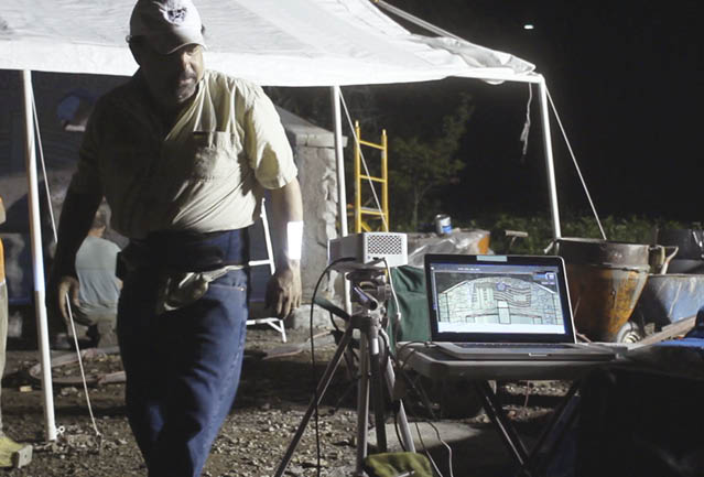 Seth Alexander walking through the job site