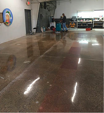 Stone Sole Associates conducts tests on the sample area.