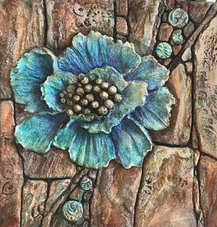 Close up of a flower that was created with bas-relief techniques