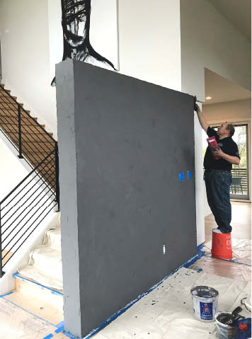 Ardex Pandomo K2, which can only be applied by certified Pandomo Elite Installers, is the microtopping on this wall. The installer used a stone oil finish to complete the look he was going for.