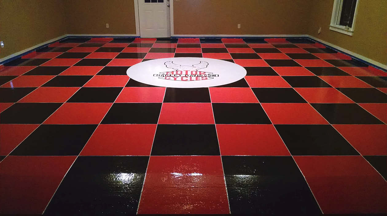 Black and red checker board concrete floor.