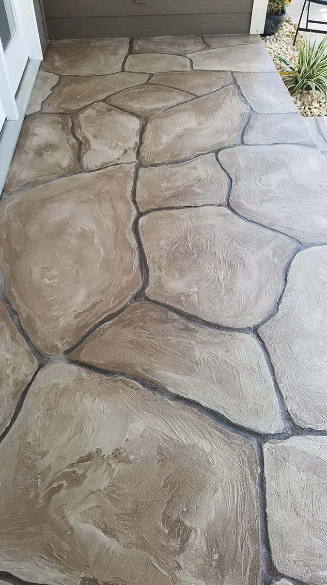Overlay cobble stone floor on concrete patio.