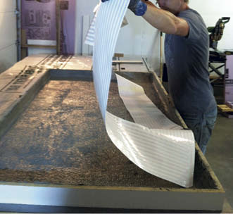 Placing the sheet of heat.