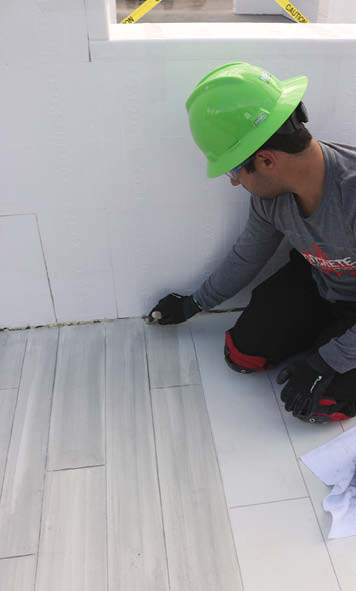 Keefe Duhon at Decorative Concrete LIVE in Las Vegas demoing plank overlay technique.