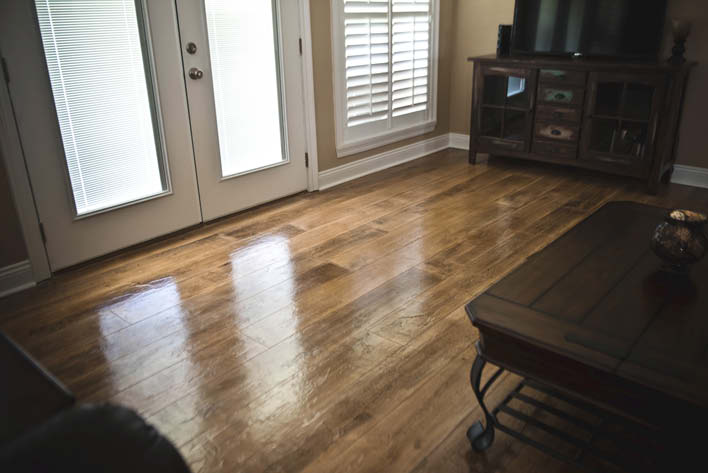 Concrete overlay woodplank in living room space