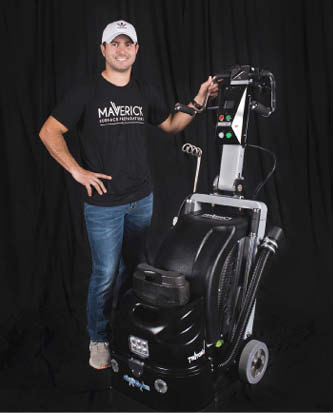 Keefe standing next to his Maverick machine.