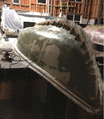 The red boat, The ReKrakken, was made with a traditional GFRC mix design of a sprayed face coat and a hand-packed AR glass-fiber backer applied about ¾-inch thick. 
