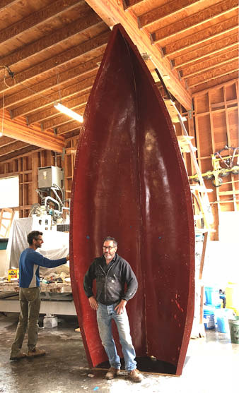 The mix design consisted of AR glass fibers, a traditional sprayed face coat and a hand-placed fibrous lightweight backer for a total thickness of 1 inch.