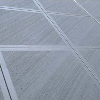 Diagonal control joints on a driveway.
