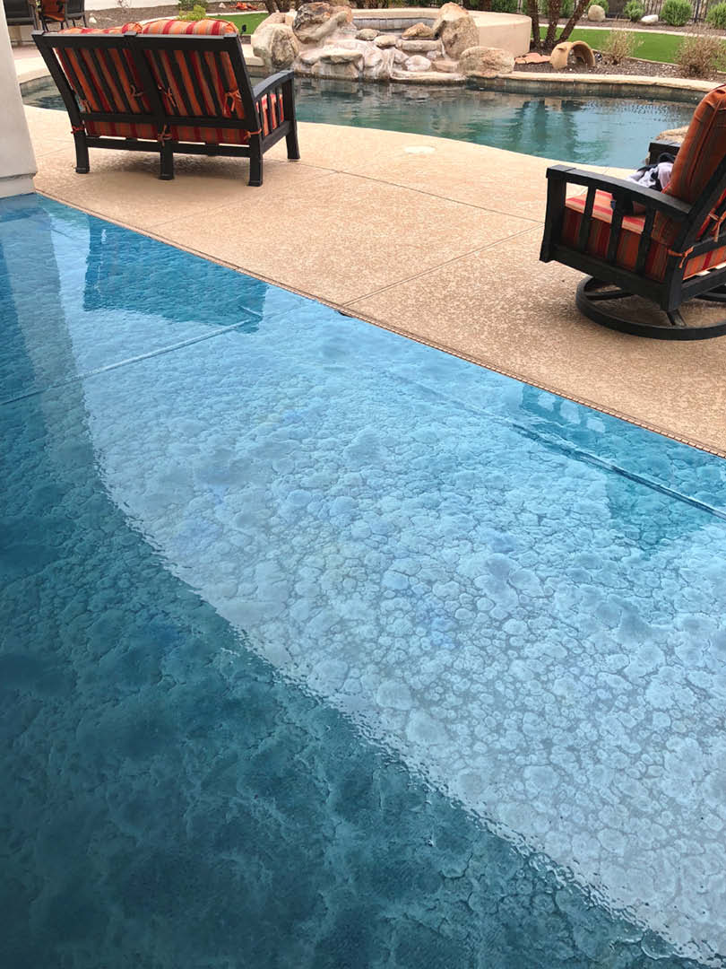This patio was grinded before an epoxy prime coat with Cohills Tahoe Blue was put down and top coated with 100 percent urethane. The urethane in this install, says installer Jon Kopp, was necessary. Epoxy wont protect a surface from the suns UV rays like a urethane does, he says.