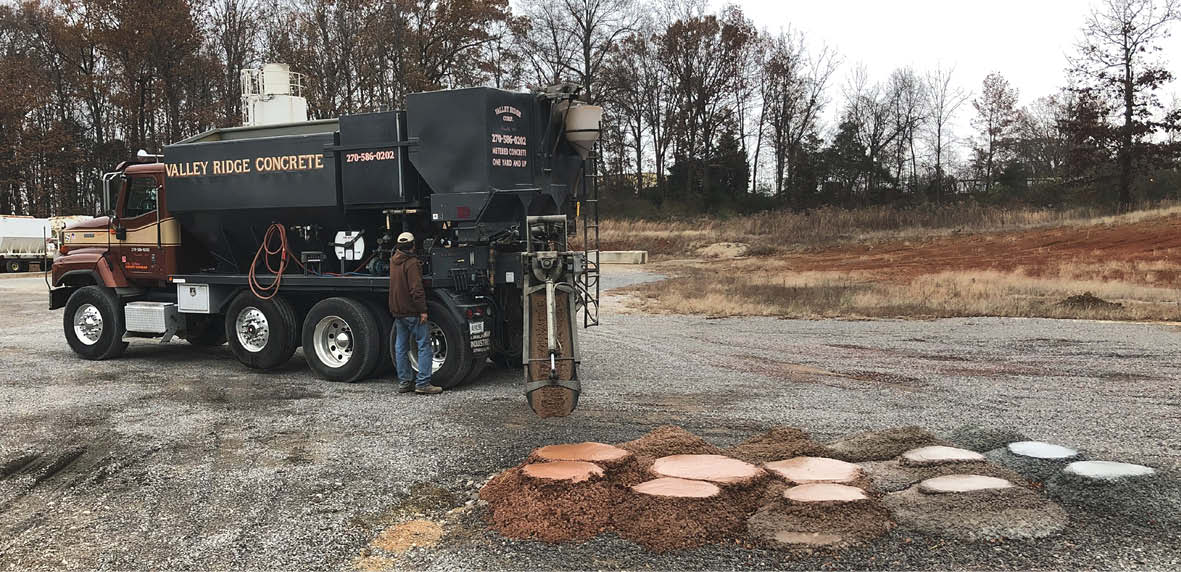 Seen here are samples of concrete with a portland cement content that have been color loaded in the mobile mixer. The sample on the far right has no color. The others are colored with the same colorant at a load rate starting at 1 percent and incrementally increasing to 4 percent. Only about a wheelbarrows amount of concrete is mixed at a time, allowing the provider to precisely control the color from one yard to the next.