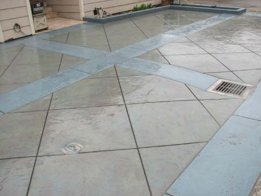 Parallel and perpendicular colored bands interface with diagonal deep joints in the panels.