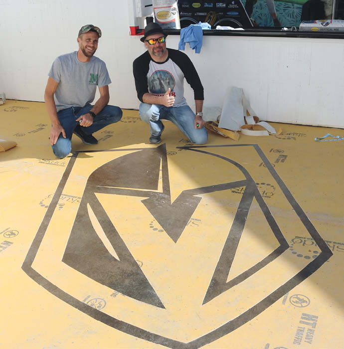 Rick Lobdell and Tim Maloney pose with their work.