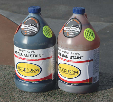 2 bottles of Brickform stain that was used throughout the space