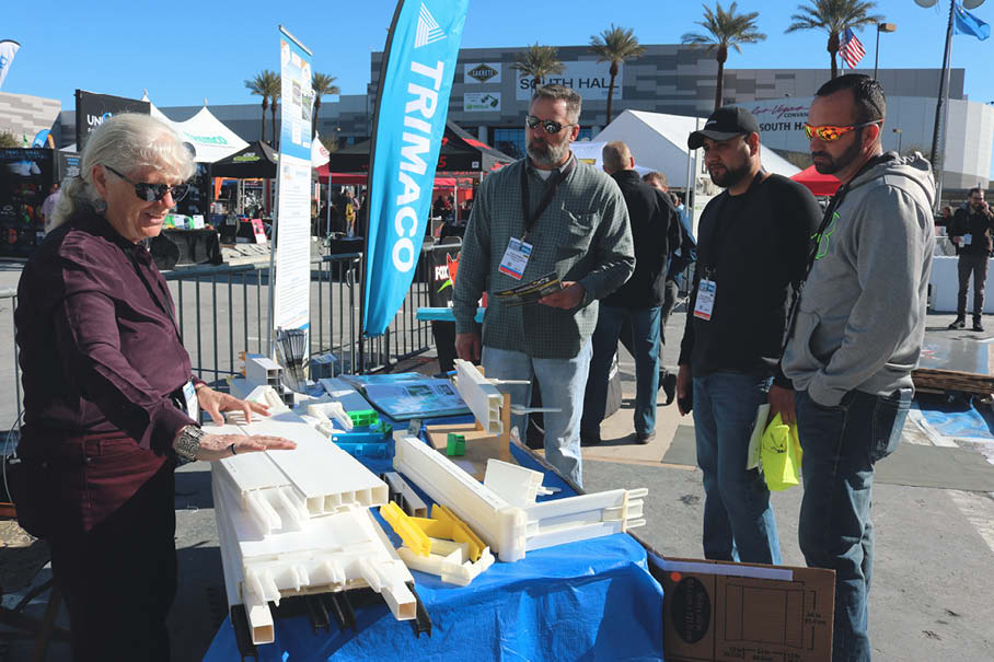 Elite Plastiforms showing their stuff at a tabletop display.