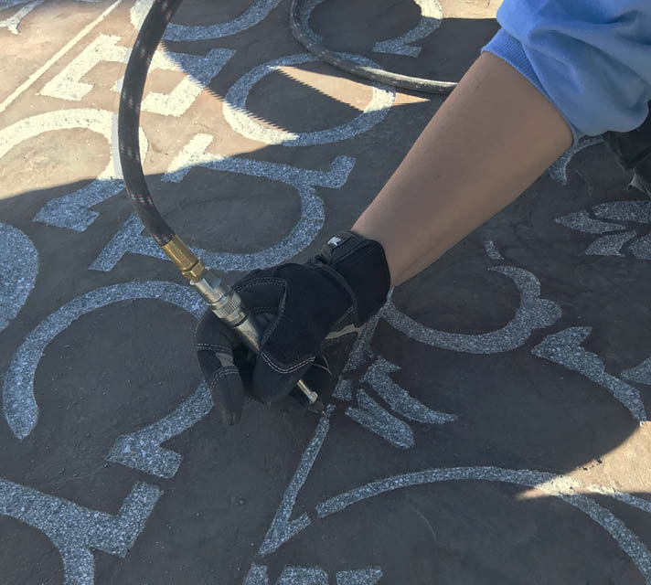 Engrave-a-Crete created a stencil and engraved in at the center of DCL.