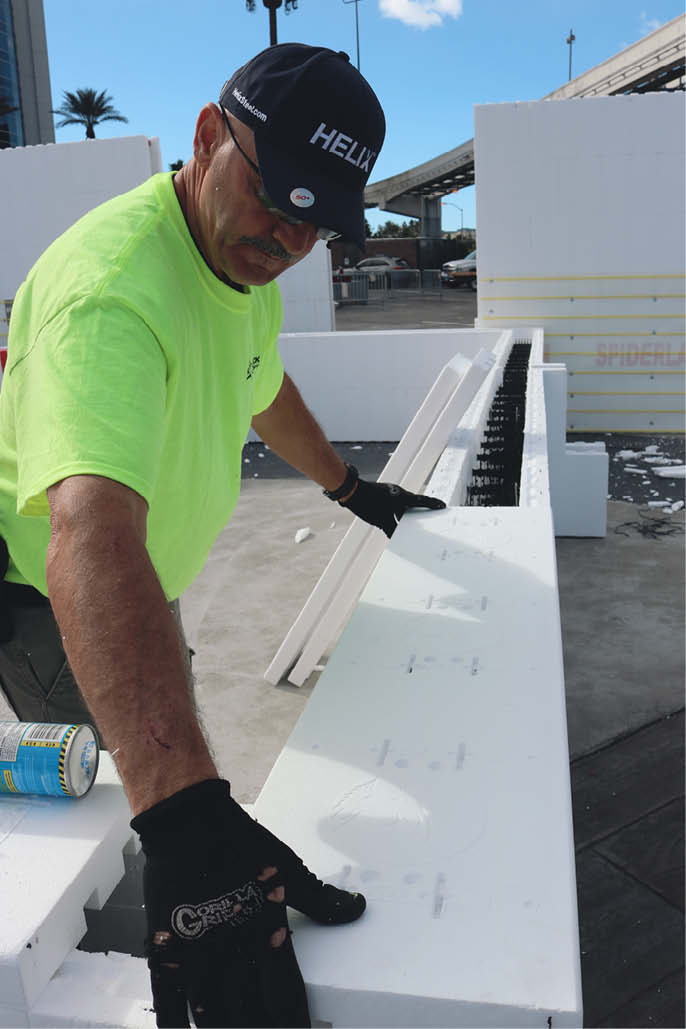 Placing foam wall caps.