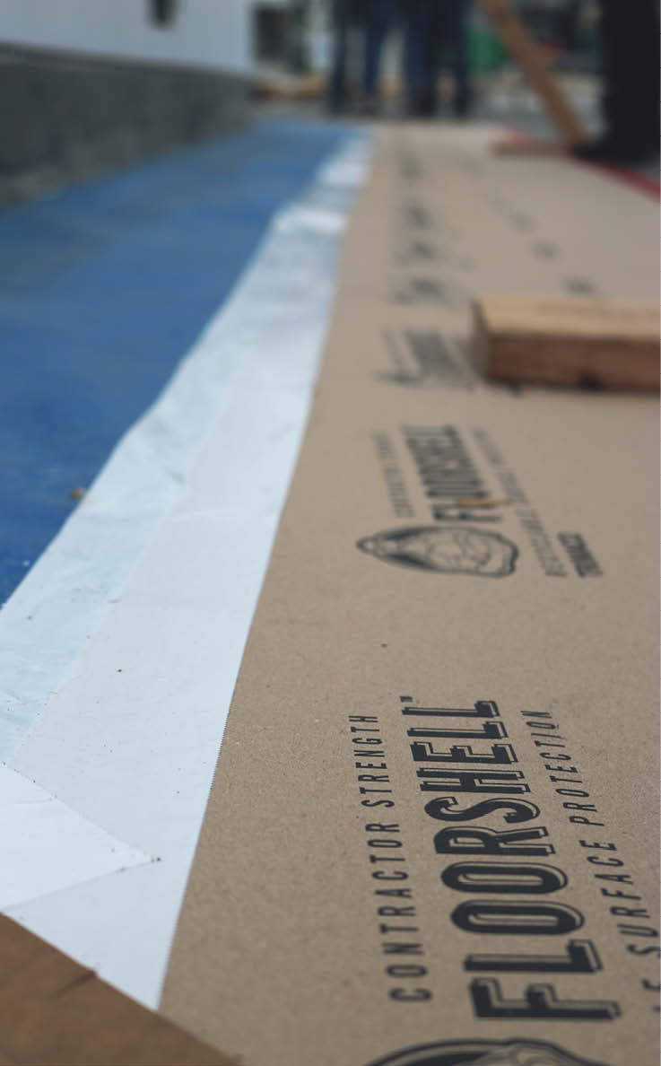 Trimaco products place on the floor as floor protection.