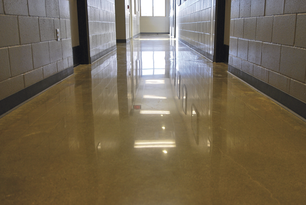 School hallway polished and shiny with a yellow dye.