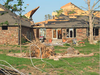 ICF Safe Rooms - An example of storm damage to residential real estate. Photo courtesy of Fox Blocks