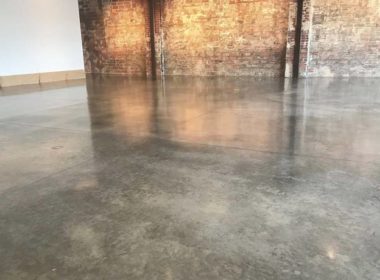 Two coats of sealer leaves this concrete shiny but will show imperfections similar to the look you get when acid staining.
