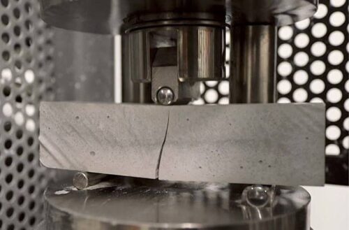 Concrete with a break in the middle to indicate flexural break